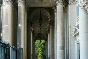 Berlin, Germany-august 9, 2022-details of the colonnade at the entrance to the cathedral in Berlin during a sunny day photo