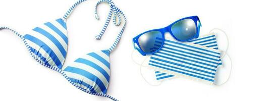 Sunglasses with Corona virus mask and bikini photo