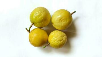 Unfresh yellow passion fruit isolated on white background photo