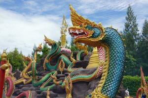 The serpent statue at Wat Don Khanak, Nakhon Pathom, Thailand photo