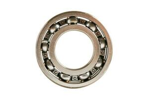 Bearing isolated on white background with clipping path, mechanical engine component. photo