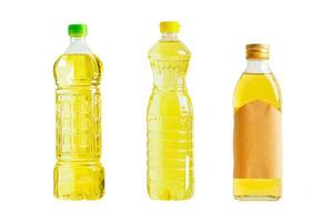 Vegetable and olive oil glass bottle isolated on white background with clipping path, organic healthy food for cooking. photo