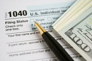 Tax form 1040 U.S. Individual Income Tax Return, business finance concept. photo