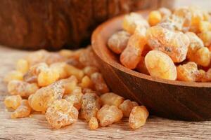 Frankincense or olibanum aromatic resin used in incense and perfumes. photo