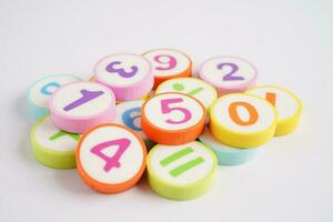 Number wood block cubes for learning Mathematic, education math concept. photo