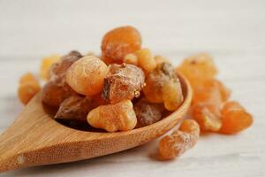 Frankincense or olibanum aromatic resin used in incense and perfumes. photo