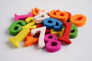 Number wood block cubes for learning Mathematic, education math concept. photo