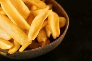 Fried potato  texture with lots of cut potatoes photo