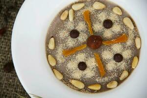 Assidat zgougou - traditional tunisian dessert prepared for celebration the birth of prophet photo