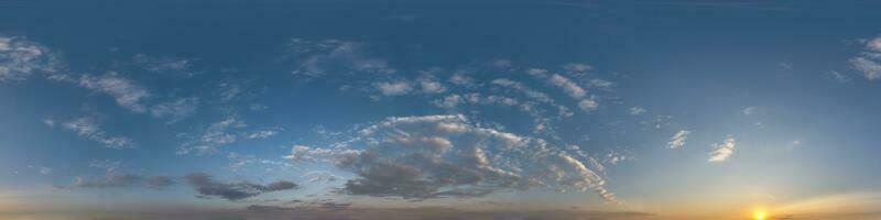 sunset skydome with evening clouds as seamless hdri 360 panorama view in spherical equirectangular format for use in 3d graphics or game development as sky dome replacement or edit drone shot photo