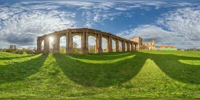 full spherical hdri 360 panorama near stone abandoned ruined palace building with columns at evening  with sunrays in equirectangular projection, VR AR virtual reality content photo