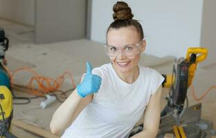 Happy young lady. Working background. photo