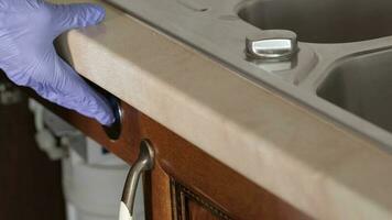 Door of dishwashing machine with function buttons. Closeup video