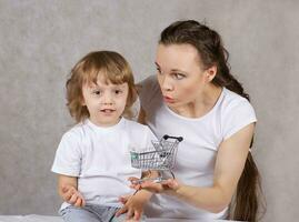 Young mother with her son. Closeup photo