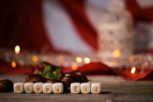 Words HAPPY EID composed of wooden dices photo