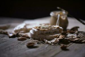 Homemade almond butter on a slice of rice crispbread. photo