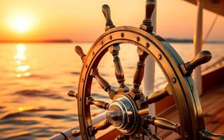 Rudder wheel of a ship and sea horizon in the background at sunset. photo