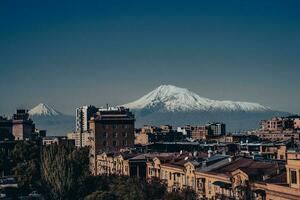 Cityscape with mountain view in a day time concept photo. photo