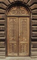 Elegant wooden door old building exterior concept photo. photo