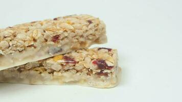 Almond , Raisin and oat protein bars on table video