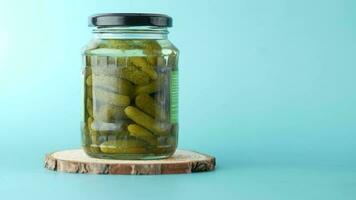 Bottle of pickled cucumbers, pickles on table video