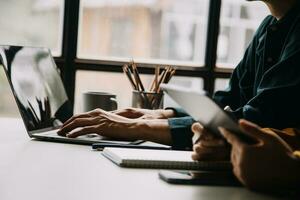 Financial Business team present. Business man hands hold documents with financial statistic stock photo, discussion, and analysis report data the charts and graphs. Finance Financial concept photo