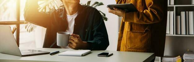 Financial Business team present. Business man hands hold documents with financial statistic stock photo, discussion, and analysis report data the charts and graphs. Finance Financial concept photo