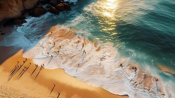 people on the beach and sea waves top view taking by drone summer vibes on beach photo