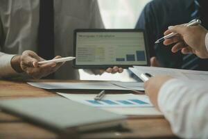 Team of business people working together in the meeting room office, teamwork background charts and graphs banner, double exposure successful teamwork,business planning concept. photo