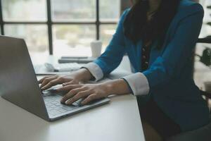 Business Documents, Auditor businesswoman checking searching document legal prepare paperwork or report for analysis TAX time,accountant Documents data contract partner deal in workplace office photo