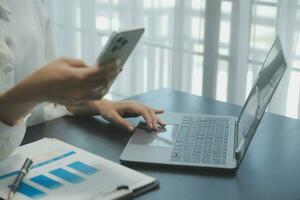 Audit concept,Administrator business man financial inspector and secretary making report calculating balance. Internal Revenue Service checking document. photo