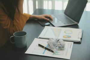 Audit concept,Administrator business man financial inspector and secretary making report calculating balance. Internal Revenue Service checking document. photo