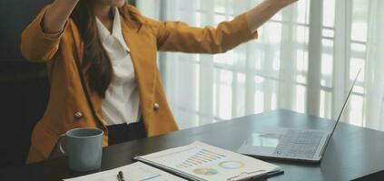 Audit concept,Administrator business man financial inspector and secretary making report calculating balance. Internal Revenue Service checking document. photo