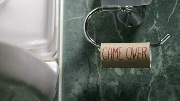 Messages written on a roll of toilet paper -Game over video