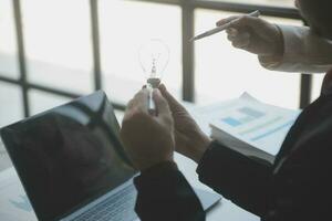 Audit concept,Administrator business man financial inspector and secretary making report calculating balance. Internal Revenue Service checking document. photo