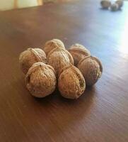 See walnut seeds on a table photo