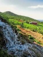 Water spring side of a country house photo