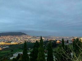 Foggy evening in a top view of the city photo