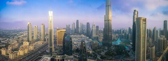 UAE, Dubai panoramic skyline view of city downtown and Dubai Mall photo