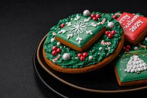 Delicious fresh sweet Christmas gingerbread with festive ornaments photo