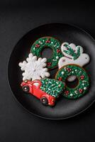 Fresh delicious baked christmas or new year gingerbread cookies photo