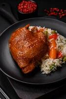 Delicious boiled rice with chicken and vegetables or risotto with salt, spices and herbs photo