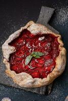 Delicious fresh sweet homemade rustic style strawberry tart photo