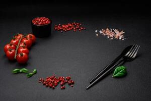 Ingredients for cooking cherry tomatoes, salt, spices and herbs photo