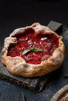 Delicious fresh sweet homemade rustic style strawberry tart photo