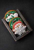 Delicious fresh colorful Christmas or New Year gingerbread cookies photo