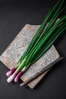 Fresh green onions for cooking a healthy vegetarian dish photo