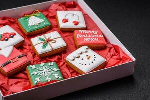 Delicious fresh colorful Christmas or New Year gingerbread cookies photo