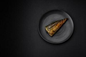 Delicious grilled ocean mackerel with salt, spices and herbs photo