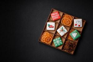 Beautiful colored Christmas gingerbread cookies for the design and decoration photo